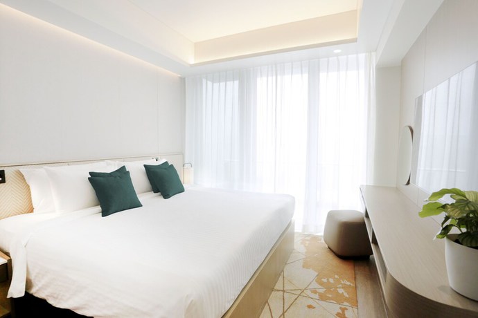 Imagen de la habitación del Hotel Lanson Place Mall Of Asia Manila. Foto 6