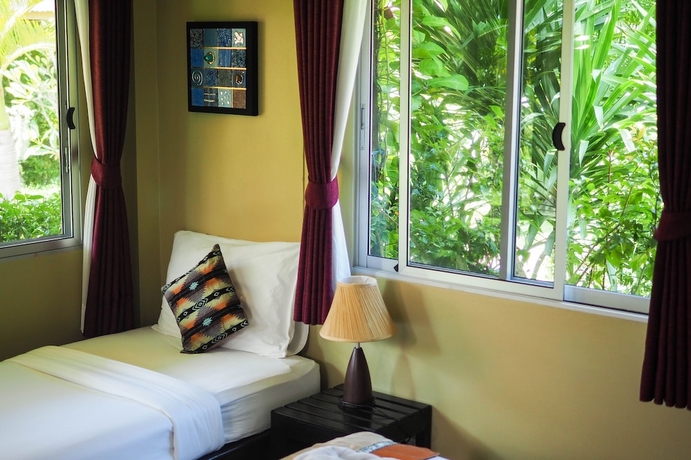 Imagen de la habitación del Hotel Lanta Castaway Beach Resort. Foto 14