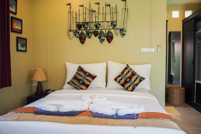 Imagen de la habitación del Hotel Lanta Castaway Beach Resort. Foto 16