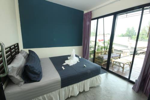 Imagen de la habitación del Hotel Lanta Complex. Foto 8