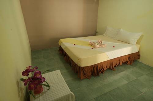 Imagen de la habitación del Hotel Lanta Complex. Foto 15