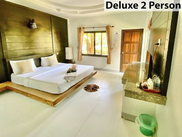 Imagen de la habitación del Hotel Lanta Emerald Bungalow. Foto 12