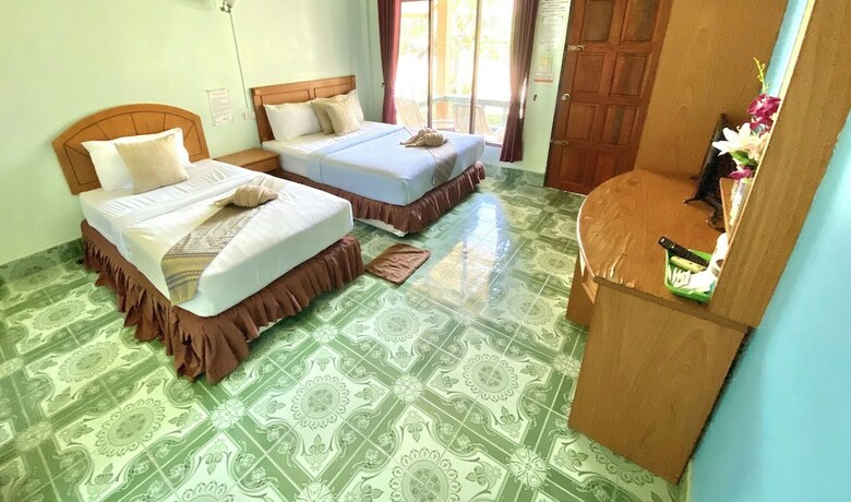 Imagen de la habitación del Hotel Lanta Emerald Bungalow. Foto 18
