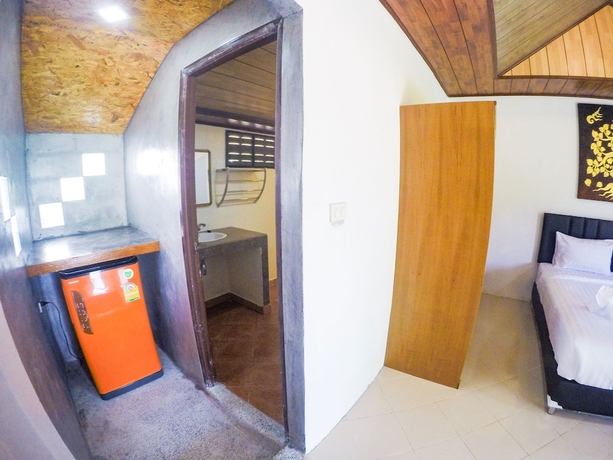 Imagen de la habitación del Hotel Lanta Mermaid Beachfront Resort. Foto 17