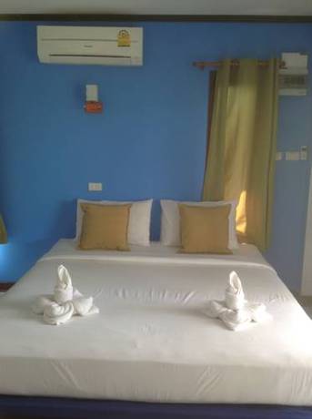 Imagen de la habitación del Hotel Lanta New Coconut Bungalow. Foto 6