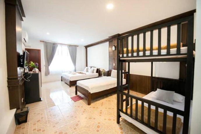 Imagen de la habitación del Hotel Lanta Nice Beach House. Foto 8