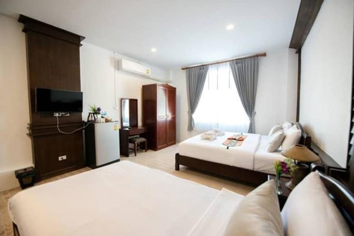Imagen de la habitación del Hotel Lanta Nice Beach House. Foto 9