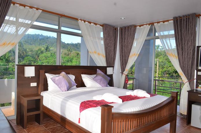 Imagen de la habitación del Hotel Lanta Nice Beach House. Foto 10
