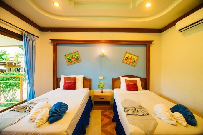Imagen de la habitación del Hotel Lanta Nice Beach Resort. Foto 5