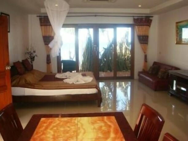 Imagen de la habitación del Hotel Lanta Paragon Bungalow. Foto 20