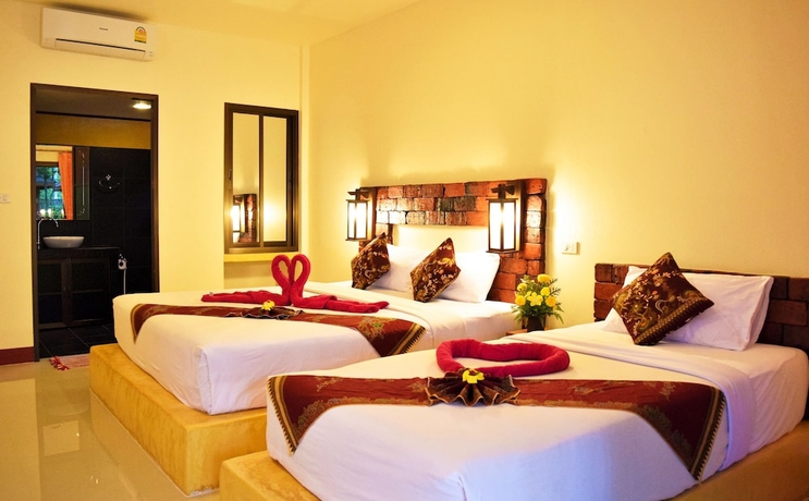 Imagen de la habitación del Hotel Lanta Pearl Beach Resort. Foto 15