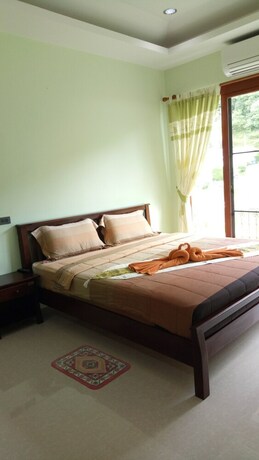 Imagen de la habitación del Hotel Lanta Sweet Mansion. Foto 30
