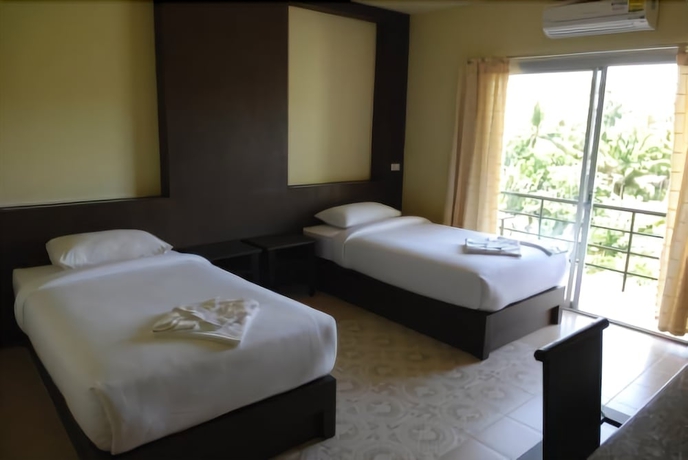 Imagen de la habitación del Hotel Lanta Thip House. Foto 7
