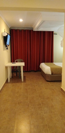 Imagen de la habitación del Hotel Lantana Comfy. Foto 15