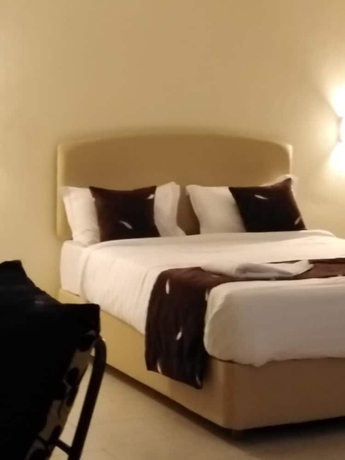 Imagen de la habitación del Hotel Lantana Comfy. Foto 17