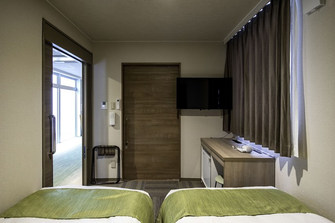 Imagen de la habitación del Hotel Lantana Naha Matsuyama. Foto 2
