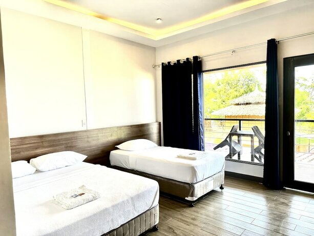 Imagen de la habitación del Hotel Lantawan Resort. Foto 18