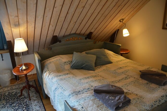 Imagen de la habitación del Hotel Lanthotell L&ouml;gn&auml;s G&aring;rd. Foto 15