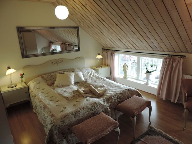 Imagen de la habitación del Hotel Lanthotell L&ouml;gn&auml;s G&aring;rd. Foto 17
