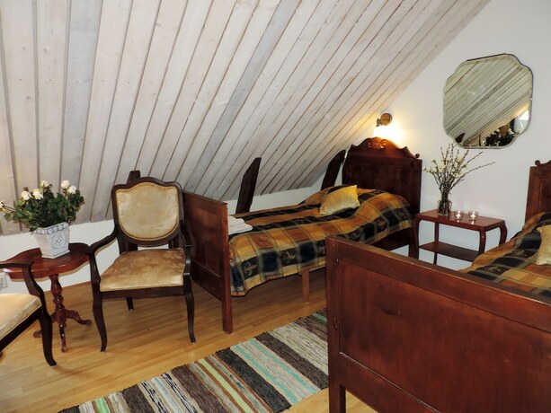 Imagen de la habitación del Hotel Lanthotell L&ouml;gn&auml;s G&aring;rd. Foto 18