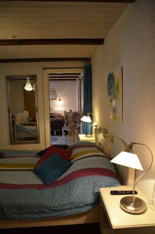 Imagen de la habitación del Hotel Lanthotell L&ouml;gn&auml;s G&aring;rd. Foto 19