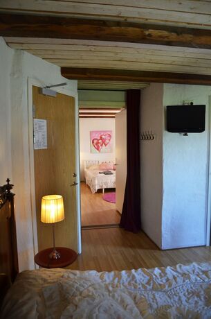 Imagen de la habitación del Hotel Lanthotell L&ouml;gn&auml;s G&aring;rd. Foto 20