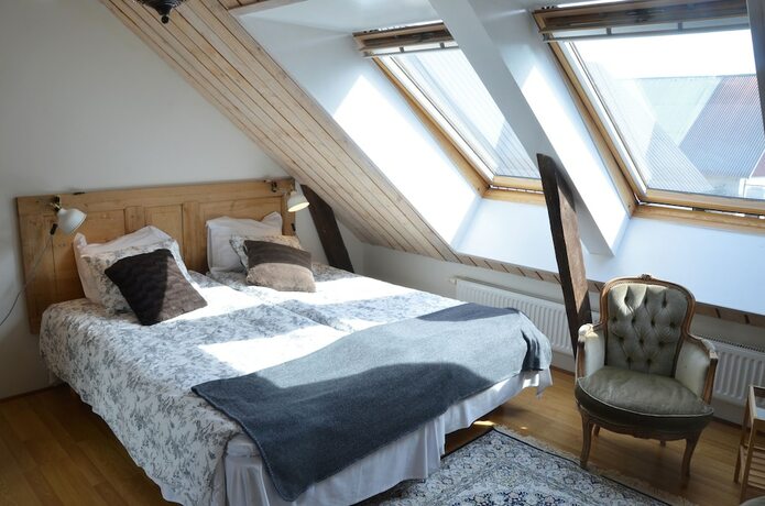 Imagen de la habitación del Hotel Lanthotell L&ouml;gn&auml;s G&aring;rd. Foto 23