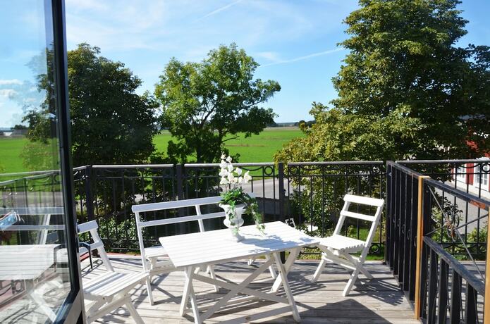 Imagen de la habitación del Hotel Lanthotell L&ouml;gn&auml;s G&aring;rd. Foto 24