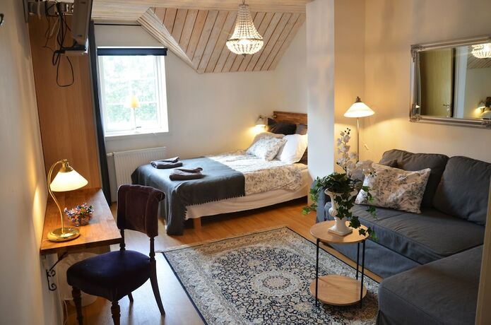 Imagen de la habitación del Hotel Lanthotell L&ouml;gn&auml;s G&aring;rd. Foto 31