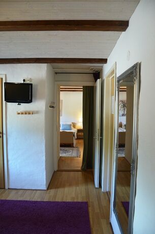 Imagen de la habitación del Hotel Lanthotell L&ouml;gn&auml;s G&aring;rd. Foto 34