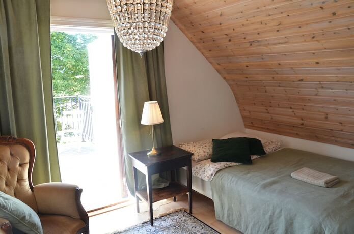 Imagen de la habitación del Hotel Lanthotell L&ouml;gn&auml;s G&aring;rd. Foto 35