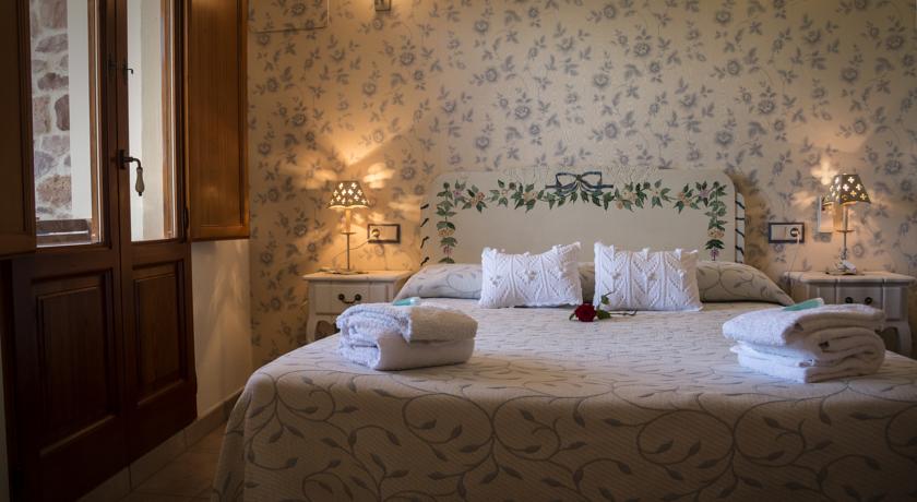 Imagen de la habitación del Hotel L'antic Portal. Foto 2