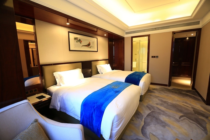 Imagen de la habitación del Hotel Lanxi International. Foto 12