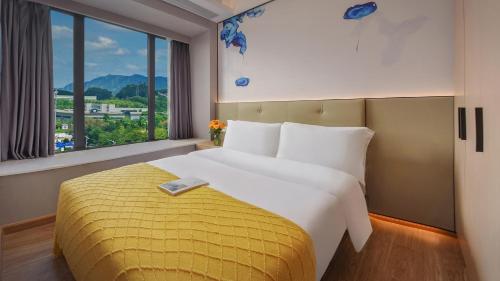 Imagen de la habitación del Hotel Lanz International Shenzhen Guangming Wisdom City. Foto 18