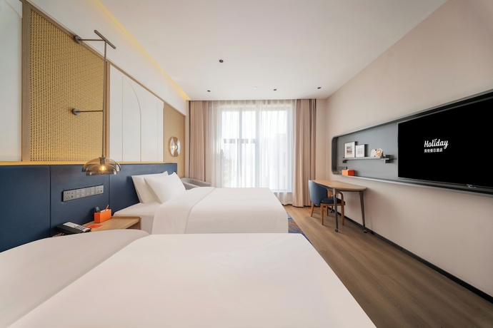 Imagen de la habitación del Hotel Lanzhou Airport Fengyue Holiday. Foto 9