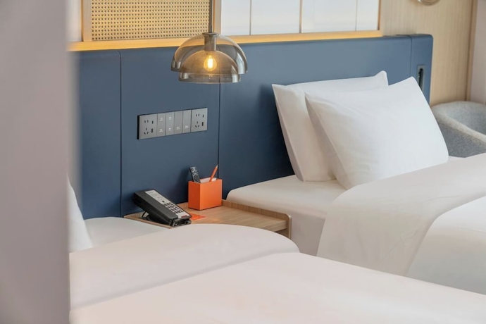 Imagen de la habitación del Hotel Lanzhou Airport Fengyue Holiday. Foto 10