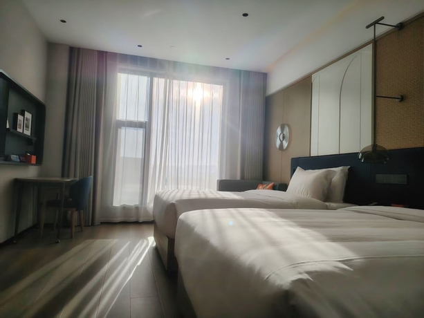 Imagen de la habitación del Hotel Lanzhou Airport Fengyue Holiday. Foto 13
