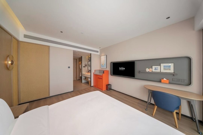 Imagen de la habitación del Hotel Lanzhou Airport Fengyue Holiday. Foto 14
