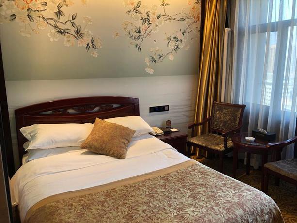 Imagen de la habitación del Hotel Lanzhou Hualian. Foto 13