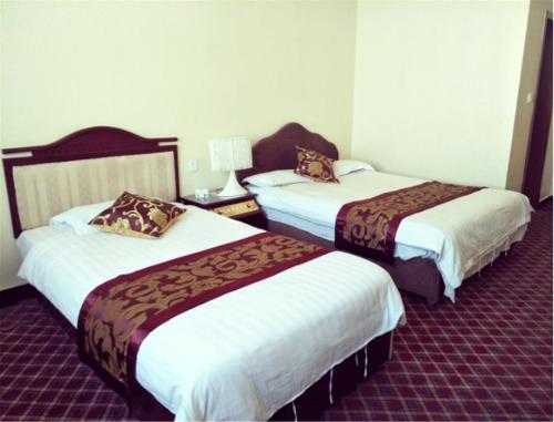 Imagen de la habitación del Hotel Lanzhou Lantian Bussiness. Foto 2