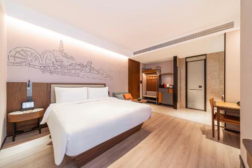 Imagen de la habitación del Hotel Lanzhou Xiguan Cross Zhongshan Bridge Yifei. Foto 16