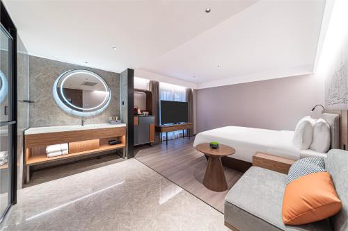 Imagen general del Hotel Lanzhou Xiguan Cross Zhongshan Bridge Yifei. Foto 2