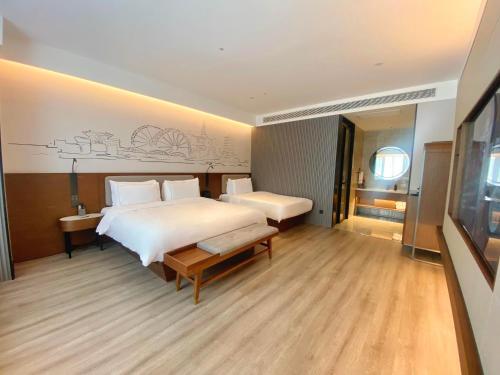 Imagen general del Hotel Lanzhou Xiguan Cross Zhongshan Bridge Yifei. Foto 9