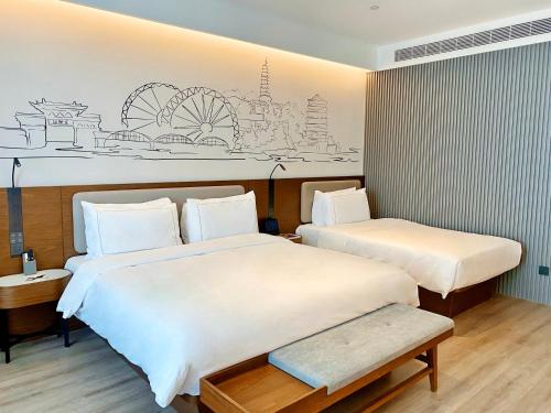 Imagen general del Hotel Lanzhou Xiguan Cross Zhongshan Bridge Yifei. Foto 11