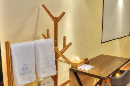 Imagen de la habitación del Hotel Lanzhu Boutique Hotels. Foto 5