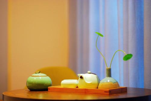 Imagen de la habitación del Hotel Lanzhu Boutique Hotels. Foto 8