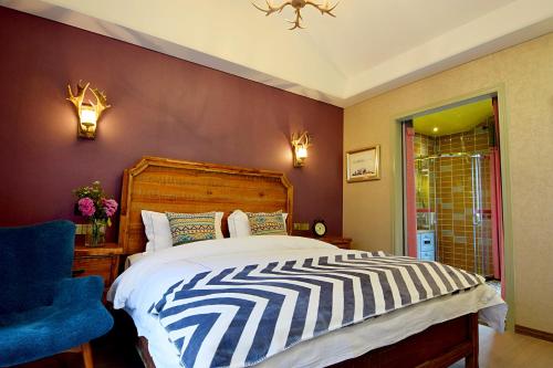 Imagen de la habitación del Hotel Laomendong Scenic Area Villa. Foto 10