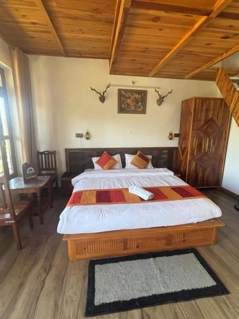 Imagen de la habitación del Hotel Lap of Himalayas Resort Kausani. Foto 9