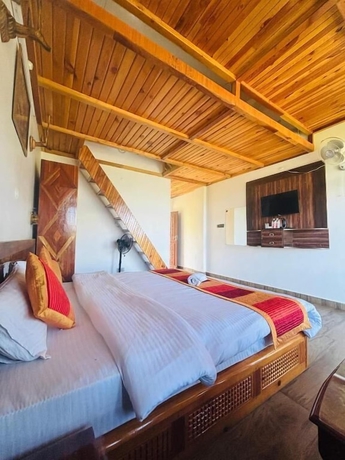 Imagen de la habitación del Hotel Lap of Himalayas Resort Kausani. Foto 10