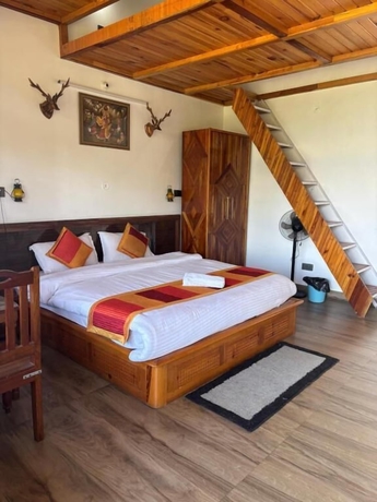 Imagen de la habitación del Hotel Lap of Himalayas Resort Kausani. Foto 11